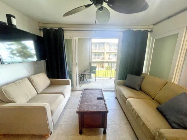 A living room with couches and a table