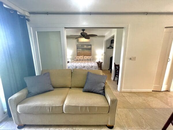 A living room with a couch and a table